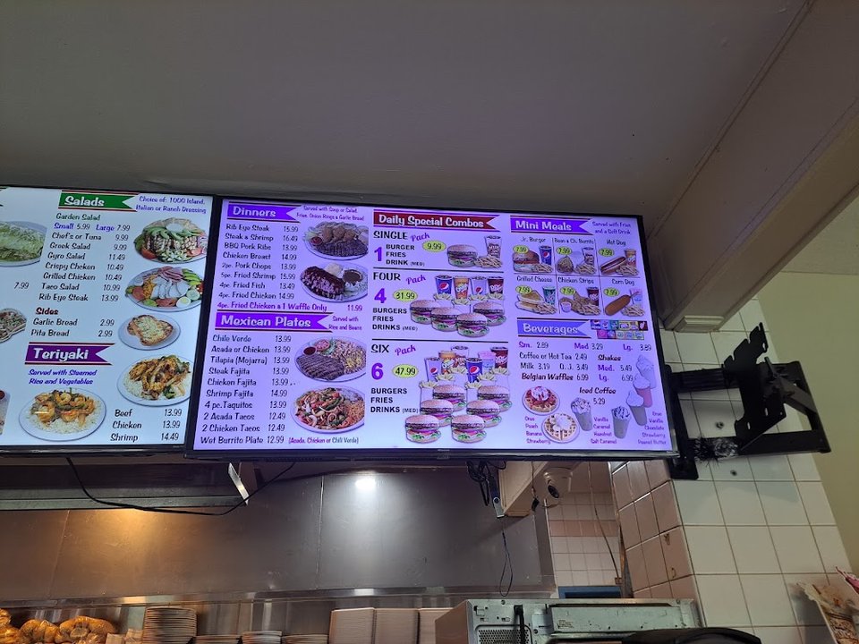 Menu page with burgers, breakfast, and Mexican dishes.